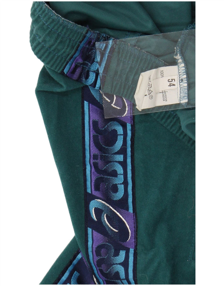 ASICS Pantalon de Survêtement Graphique Homme Large Vert Polyester