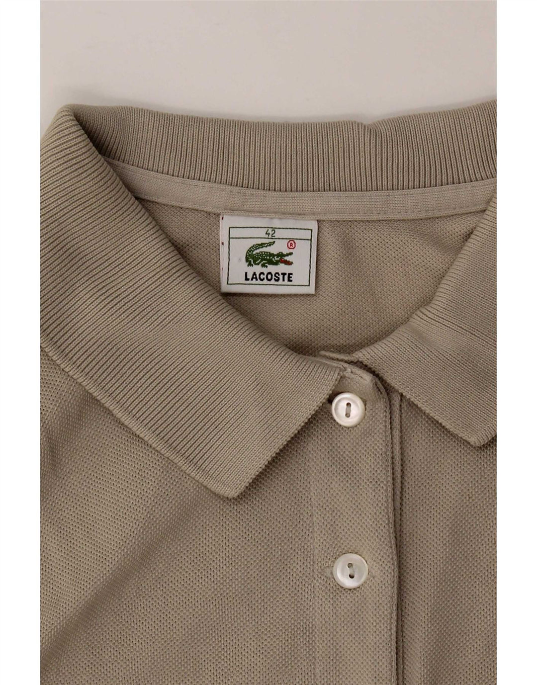 Lacoste Polo sans manches pour femme EU 42 Large Gris