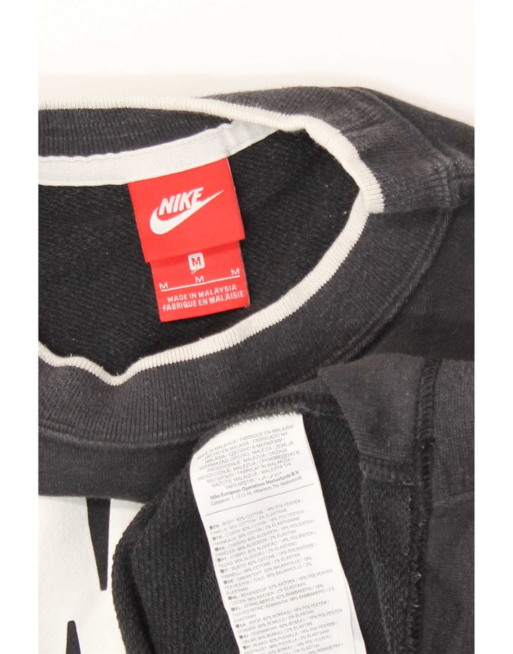 Nike Sweat-shirt surdimensionné pour femme UK 14 en coton noir moyen