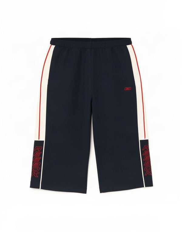 Reebok Pantalon Coupe-Vent Graphique Garçon 15-16 ans XL Bleu Marine