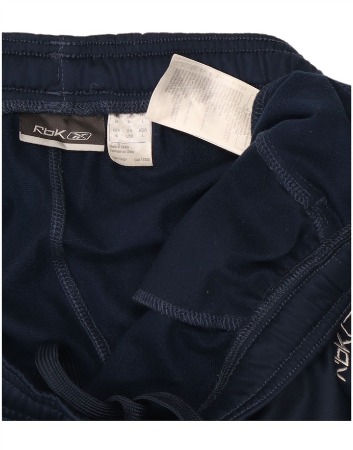 Reebok Pantalon de Survêtement Homme Bleu Marine Moyen Polyester Colorblock
