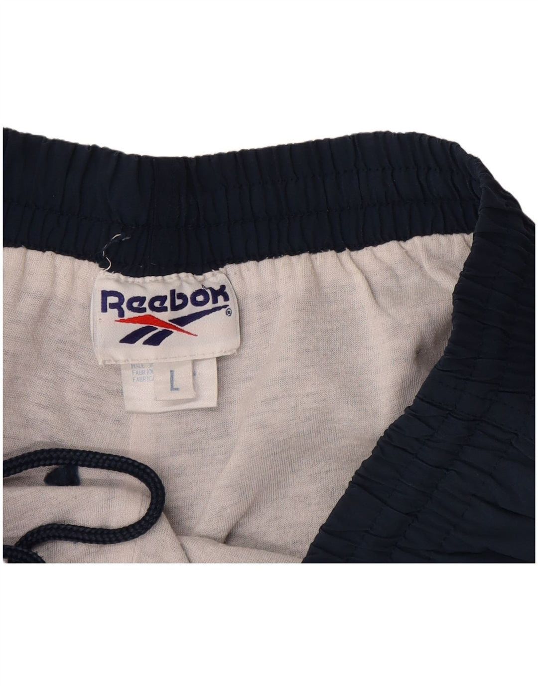 Reebok Short de Sport Homme Large Bleu Marine Nylon