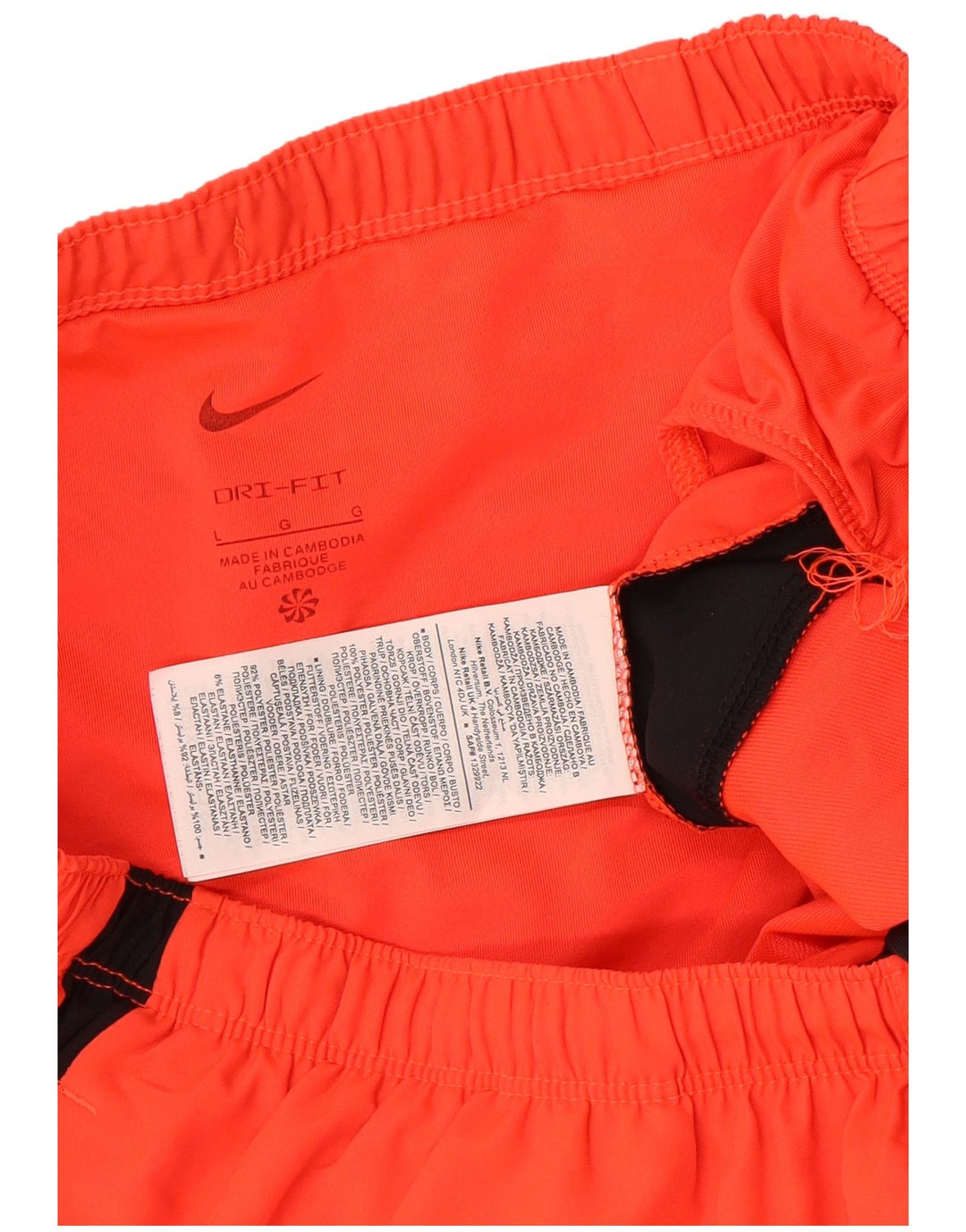 Nike Short de sport Dri Fit pour homme en polyester color block Taille L Orange