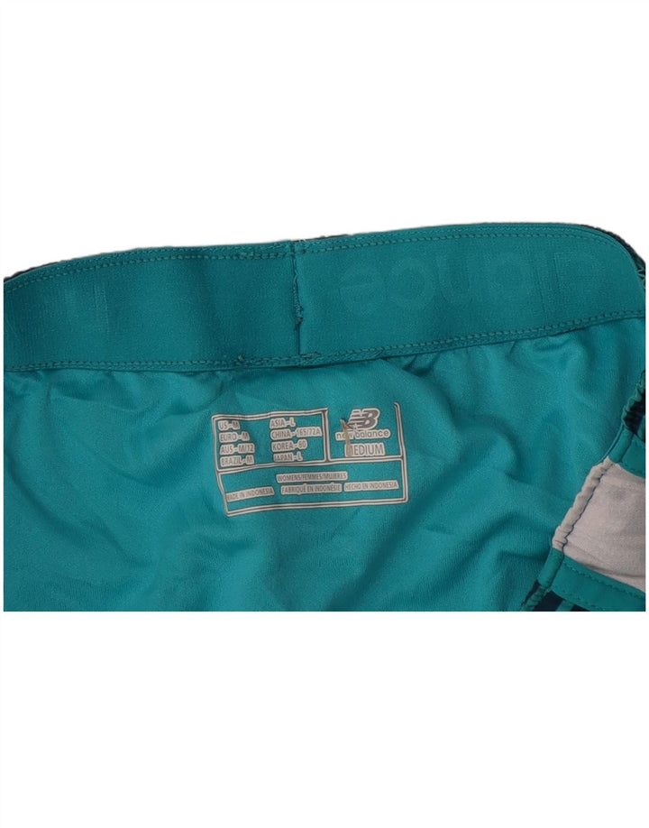 NEW BALANCE Short de sport pour femme UK 14 Bleu marine moyen rayé