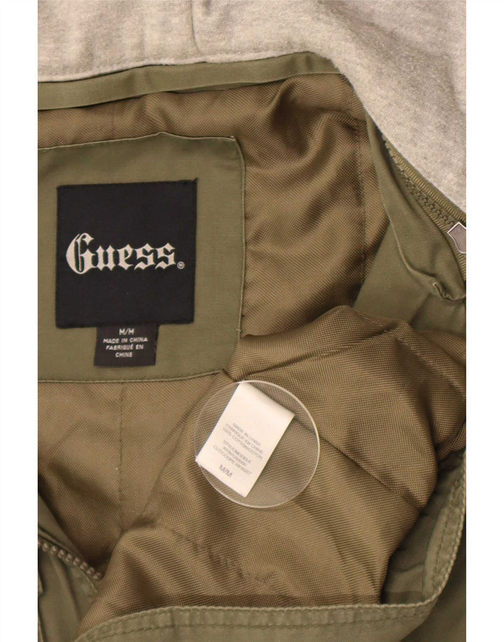 Guess Veste utilitaire à capuche graphique pour homme UK 38 Kaki moyen colour block