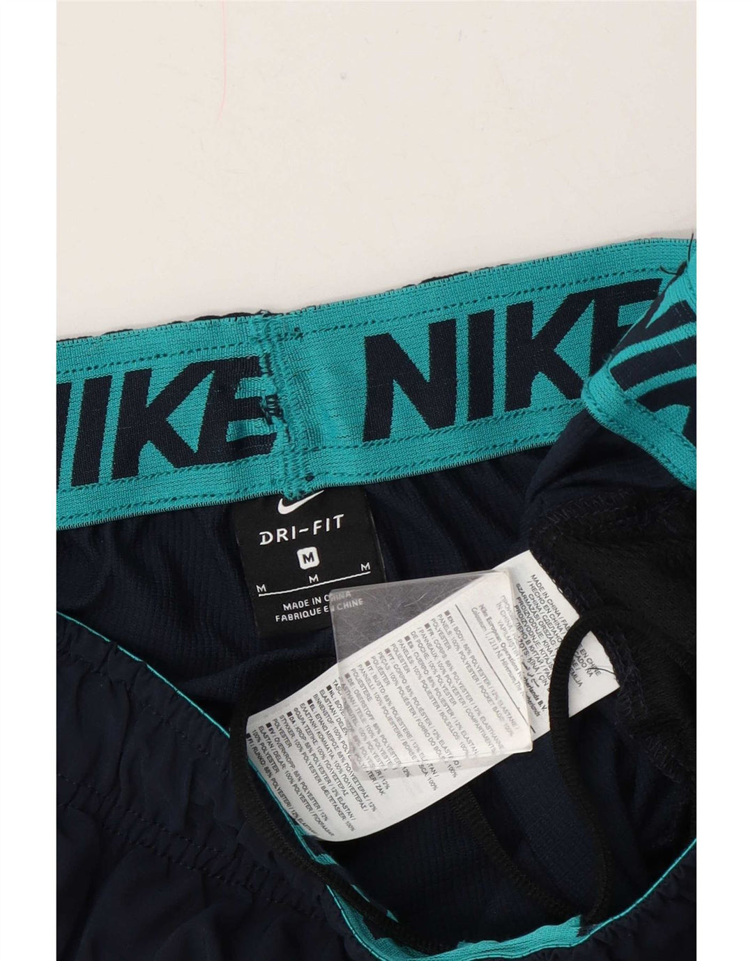 Nike Pantalon de survêtement graphique pour homme Bleu marine moyen Polyester