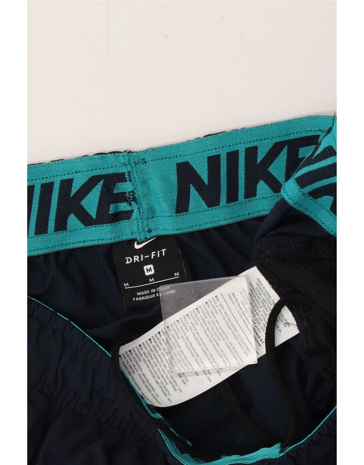 Nike Pantalon de survêtement graphique pour homme Bleu marine moyen Polyester