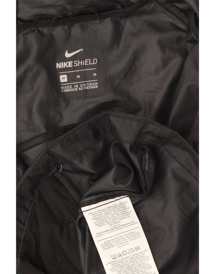 Nike Veste de pluie à capuche pour femme UK 14 Medium Noir Polyester Sports