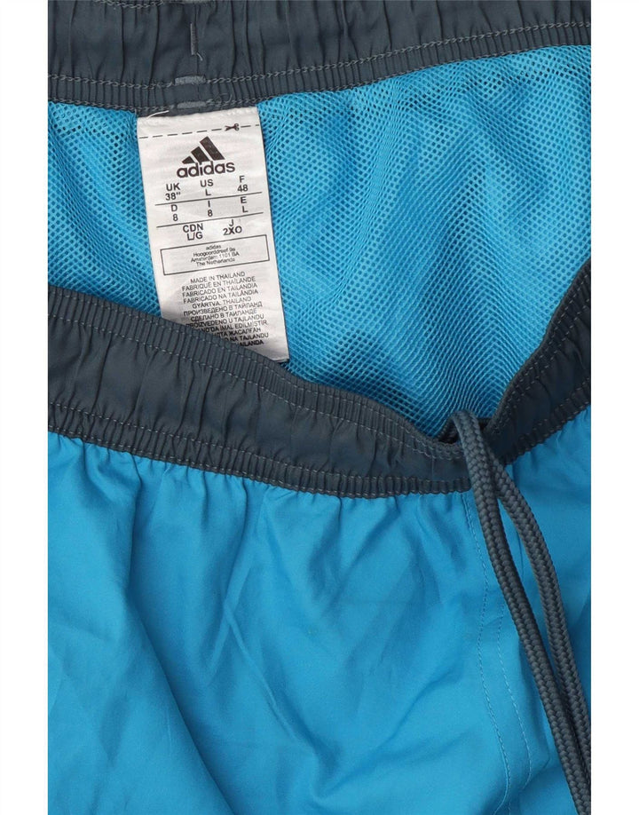 Adidas Short de sport graphique pour hommes, grand bleu, polyester color block