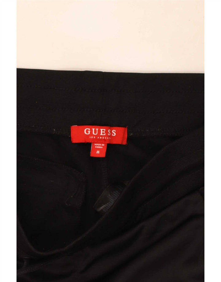 Guess Pantalon de Survêtement Graphique Joggers Homme Noir Moyen Colourblock