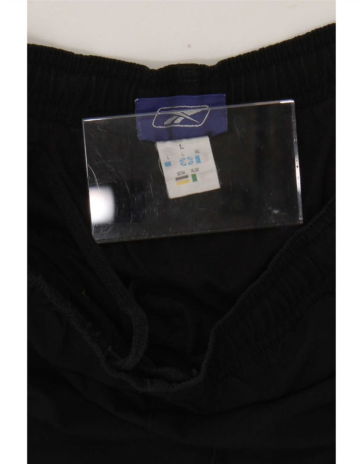 Reebok Pantalon de Survêtement Homme Joggers Large Noir Polyester