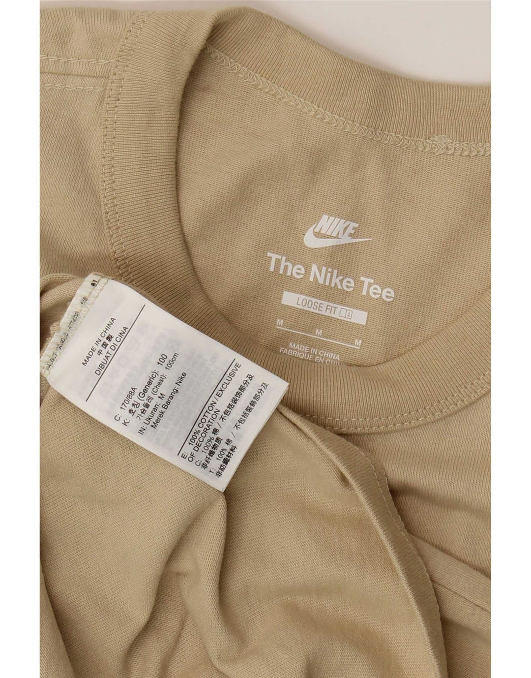 Nike T-shirt coupe ample en coton beige moyen pour homme
