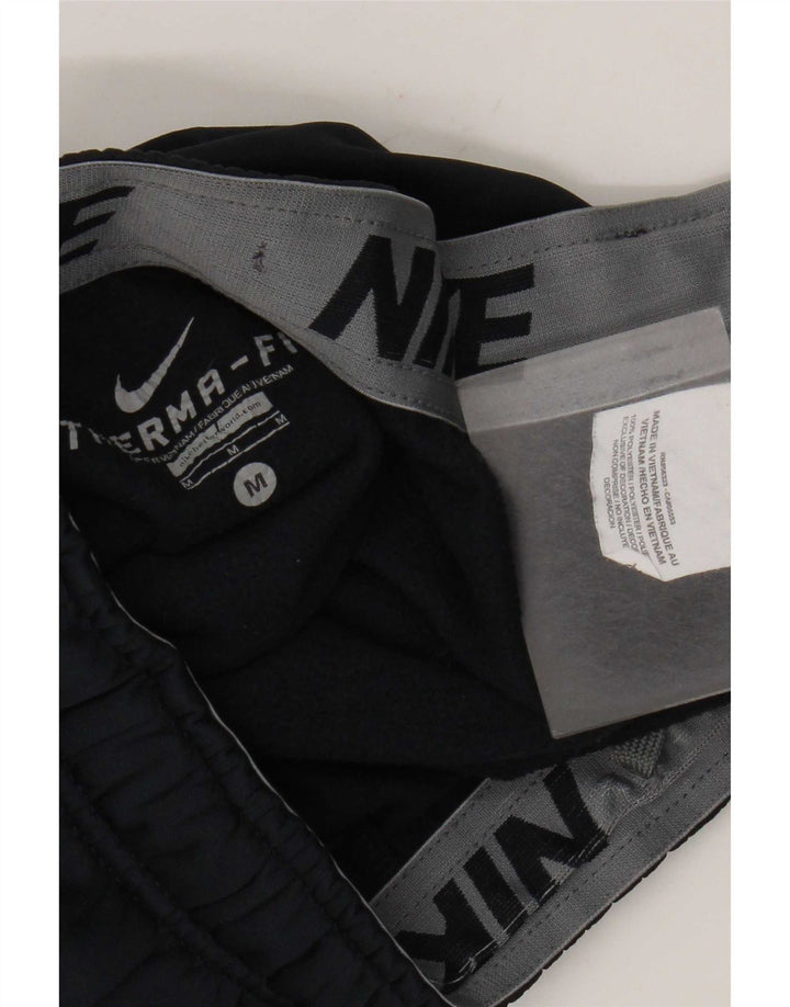 Nike Pantalon de survêtement Therma-Fit pour homme Bleu marine moyen Polyester