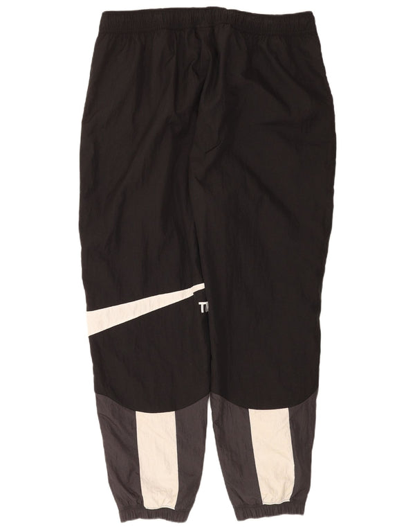 Nike Pantalon de survêtement graphique pour homme 2XL en nylon color block noir