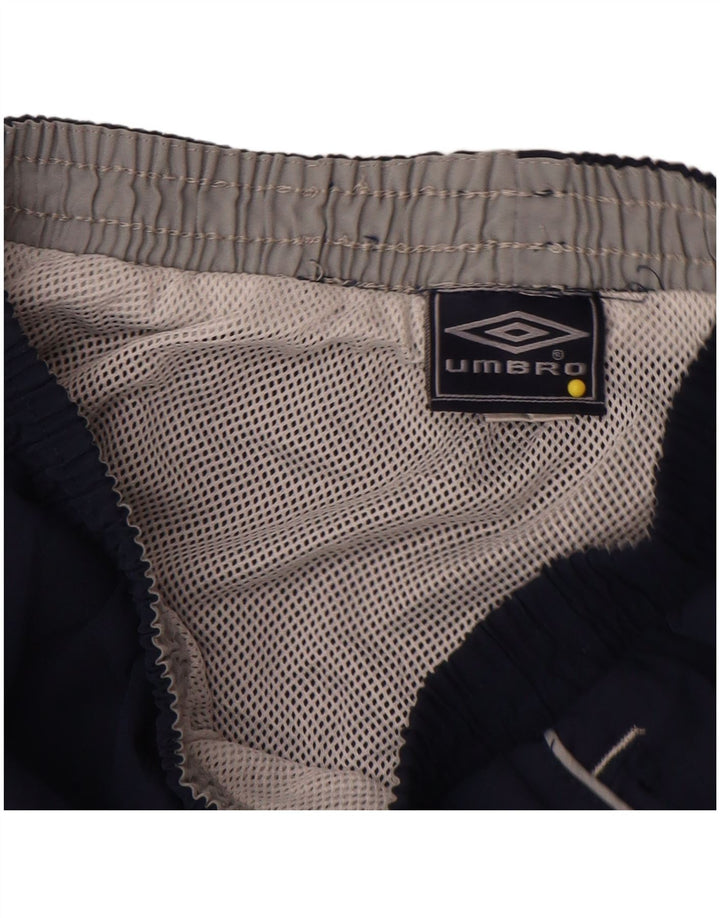 Umbro Short de Sport Graphique Garçon 9-10 ans Bleu Marine Moyen Polyester