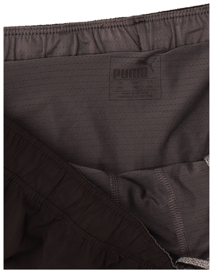 Puma Short de sport graphique pour homme 2XL Noir Polyester