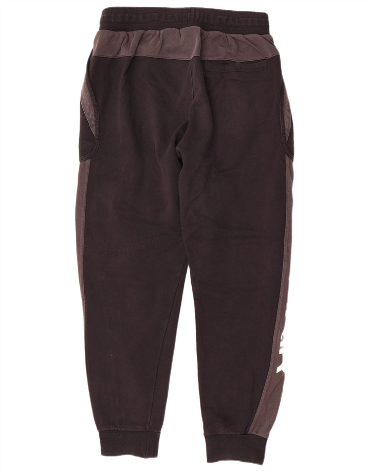 Nike Pantalon de survêtement graphique pour homme Noir moyen Colourblock