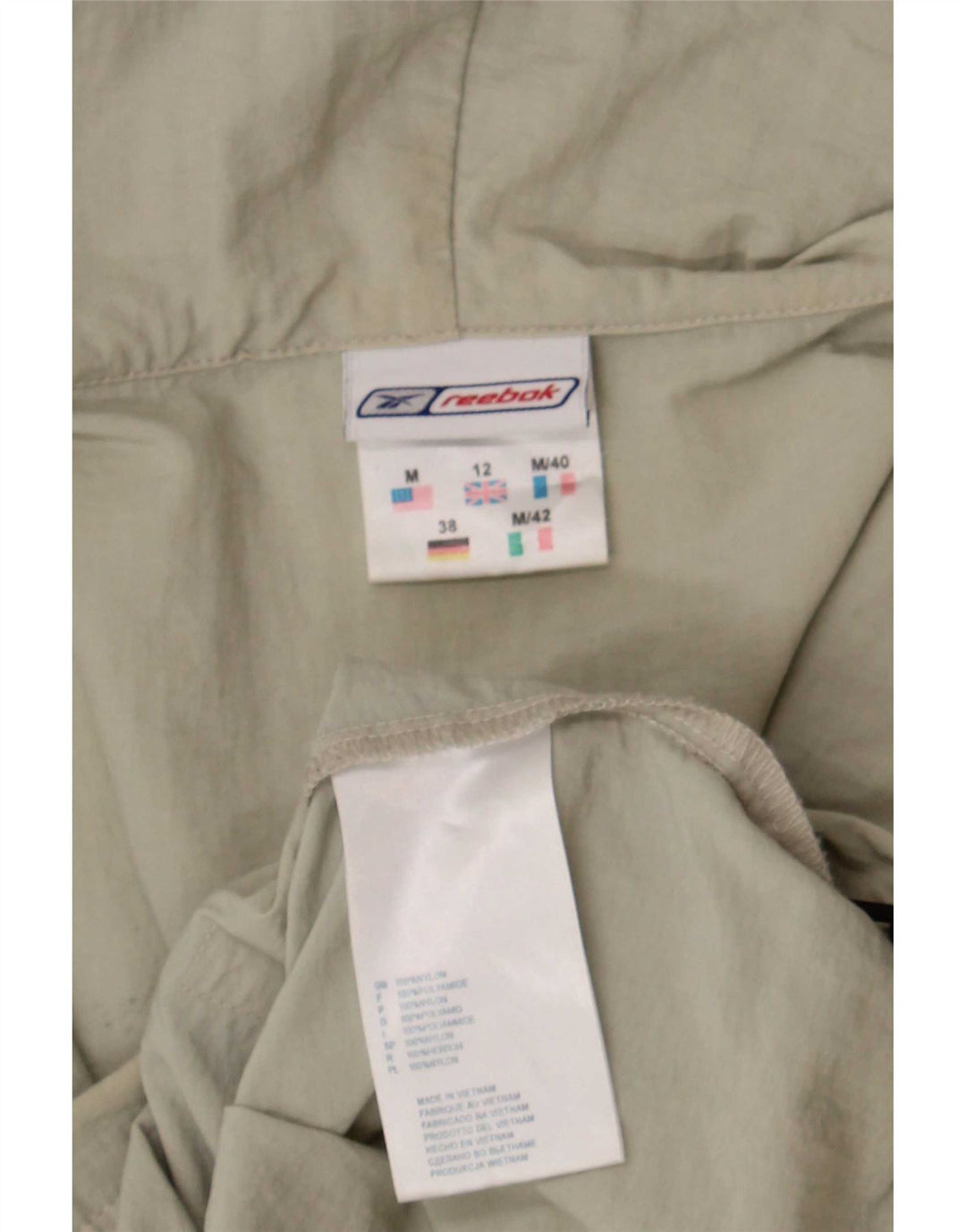 Reebok Veste de pluie à capuche pour femme UK 12 Nylon beige moyen