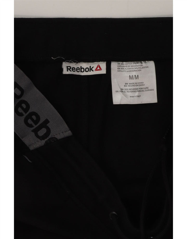 REEBOK Pantalon de Survêtement Graphique Homme Noir Colorblock