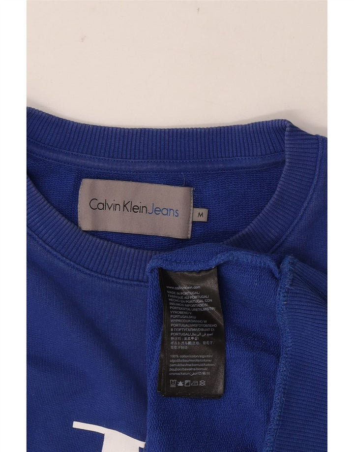 Calvin Klein Jeans Sweat-Shirt Graphique Homme Bleu Moyen Coton