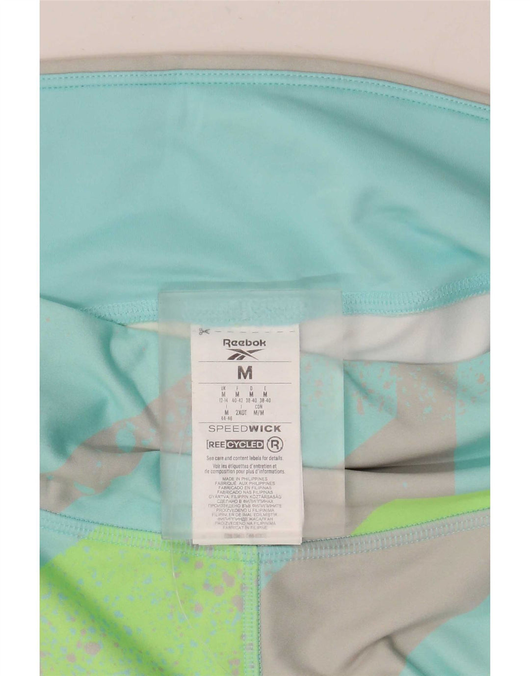 Reebok Leggings Capri Femme FR 12/14 Polyester Géométrique Turquoise Moyen