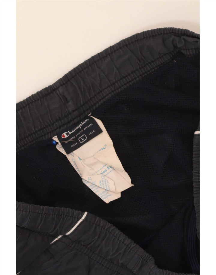 Champion Pantalon de Survêtement Homme Joggers Large Bleu Marine Polyester