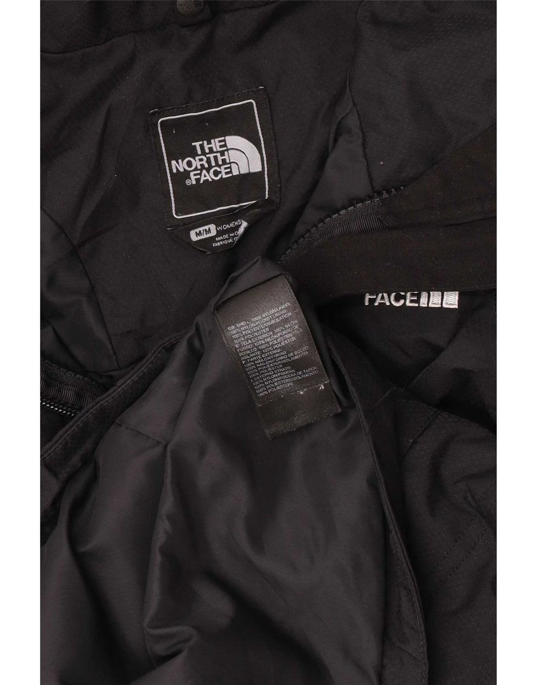 The North Face Veste coupe-vent à capuche pour femme UK 14 Medium Black Nylon