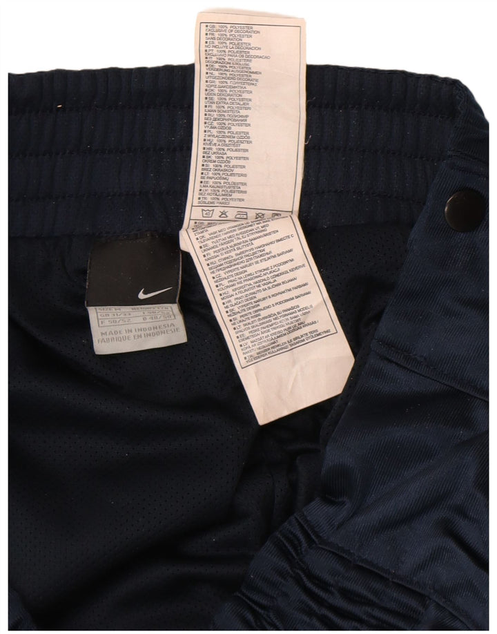 Pantalon de survêtement Nike pour homme en polyester color block bleu marine moyen