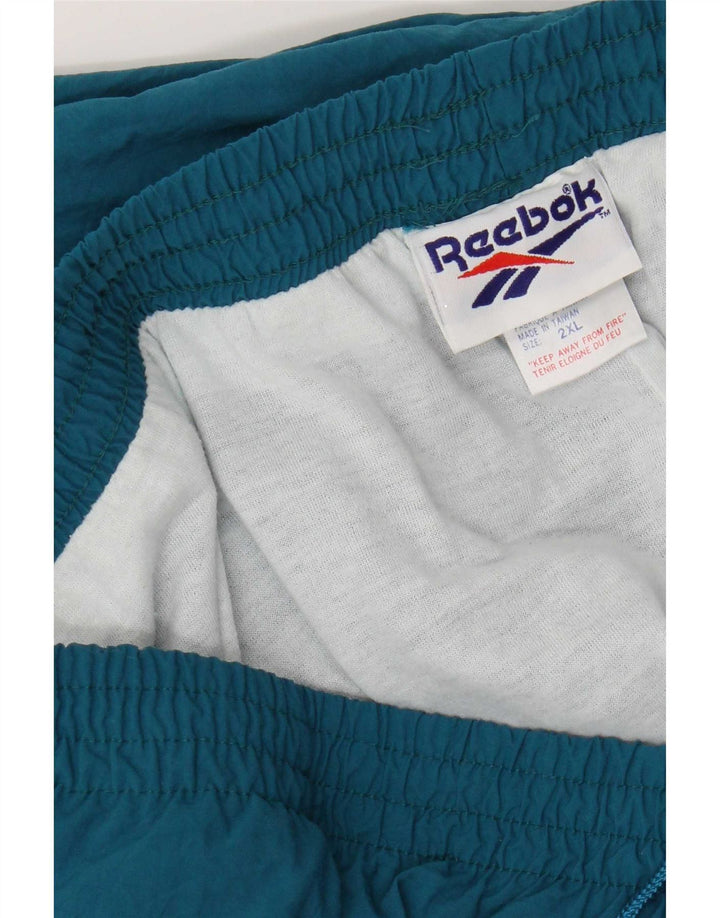 Reebok Pantalon de Survêtement Joggers 2XL Homme Bleu Nylon