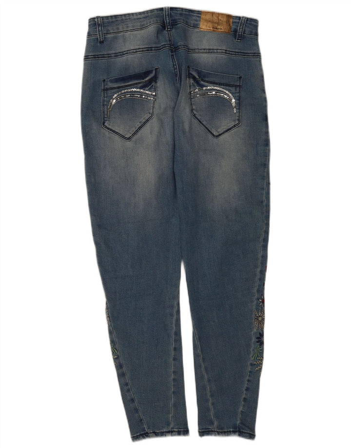 Desigual Jean slim effet vieilli W26 L26 bleu floral pour femme