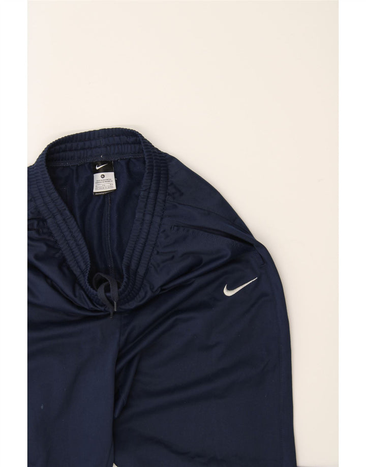 NIKE Boys Tracksuit Trousers 13-14 Years XL Navy Blue Polyester Vintage Nike and Second-Hand Nike from Messina Hembry 