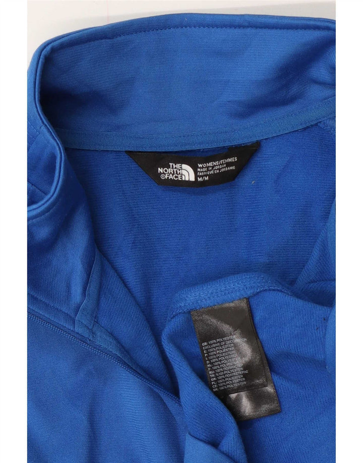 The North Face Haut de survêtement à col zippé pour femme UK 14 Bleu moyen