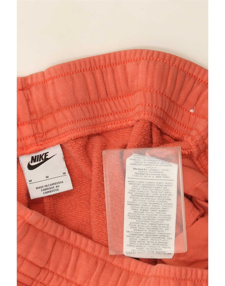 Nike Pantalon de survêtement graphique en coton orange moyen pour homme