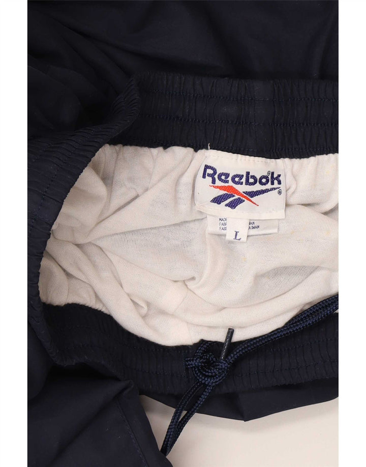 Reebok Pantalon de Survêtement Homme Joggers Large Bleu Marine Polyester
