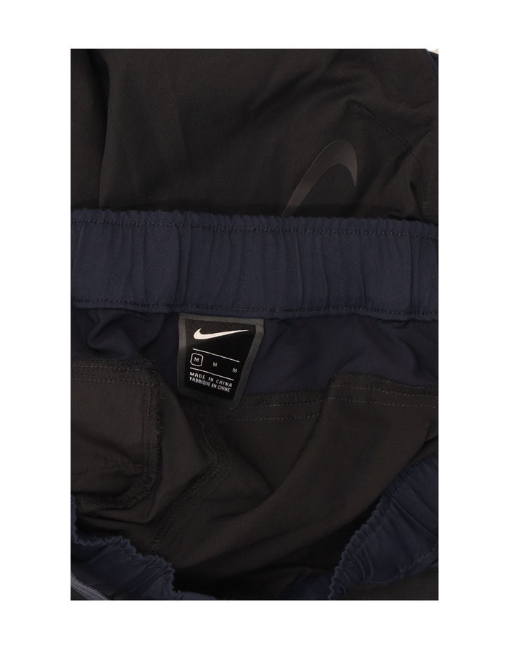 NIKE Pantalon cargo fuselé pour homme Medium W32 L27 Noir Colourblock