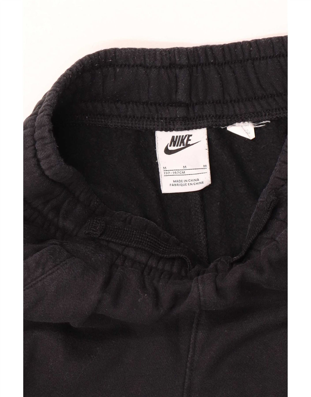 Nike Pantalon de survêtement graphique pour garçon 10-11 ans Noir moyen