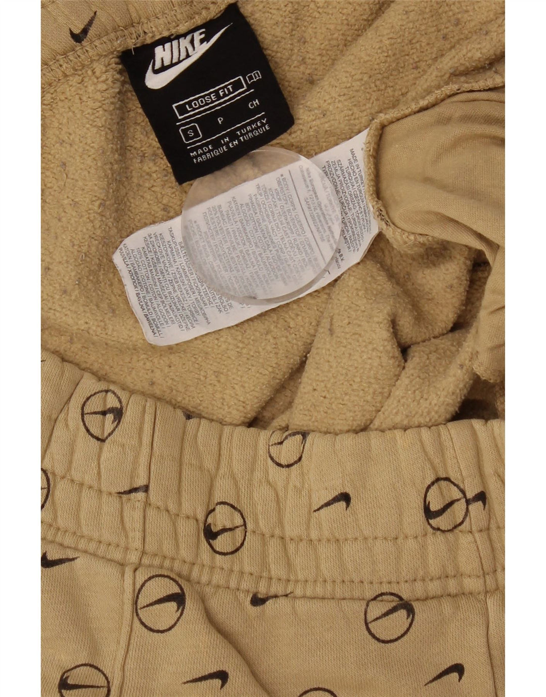 Nike Pantalon de survêtement graphique pour homme Taille S Beige Géométrique