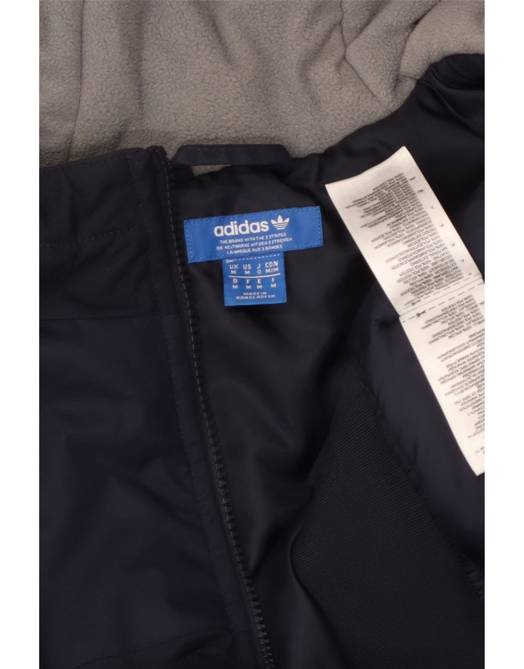 Adidas Veste coupe-vent à capuche pour homme UK 38 Bleu marine moyen Polyester