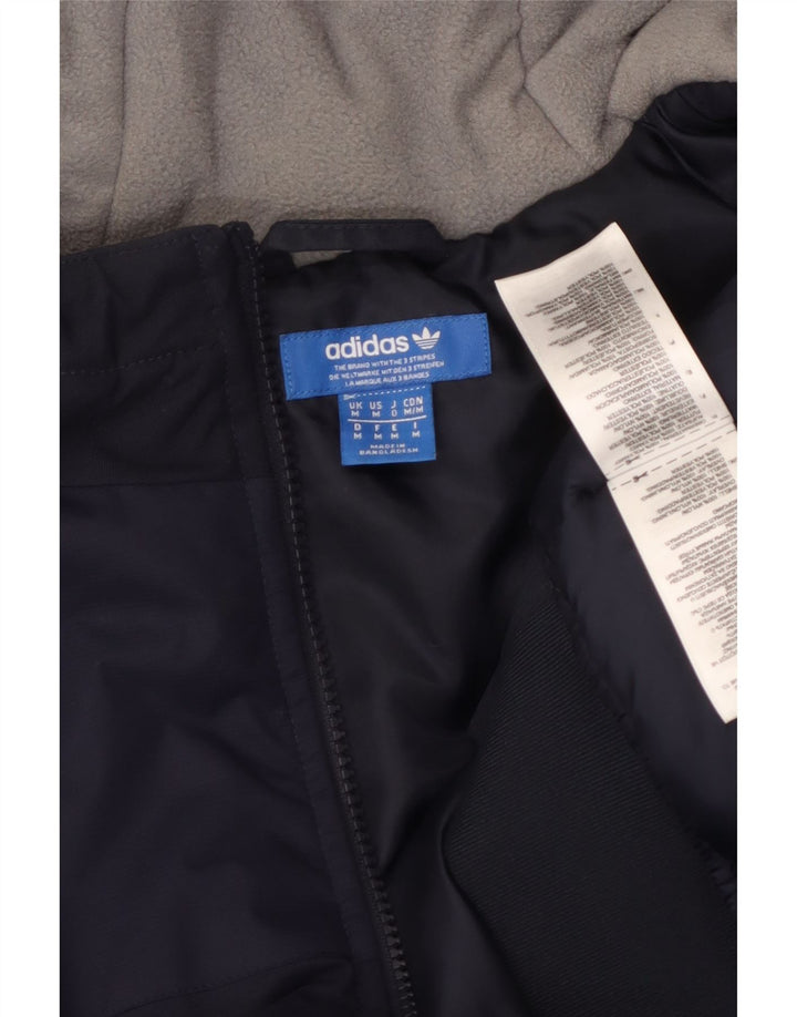 Adidas Veste coupe-vent à capuche pour homme UK 38 Bleu marine moyen Polyester