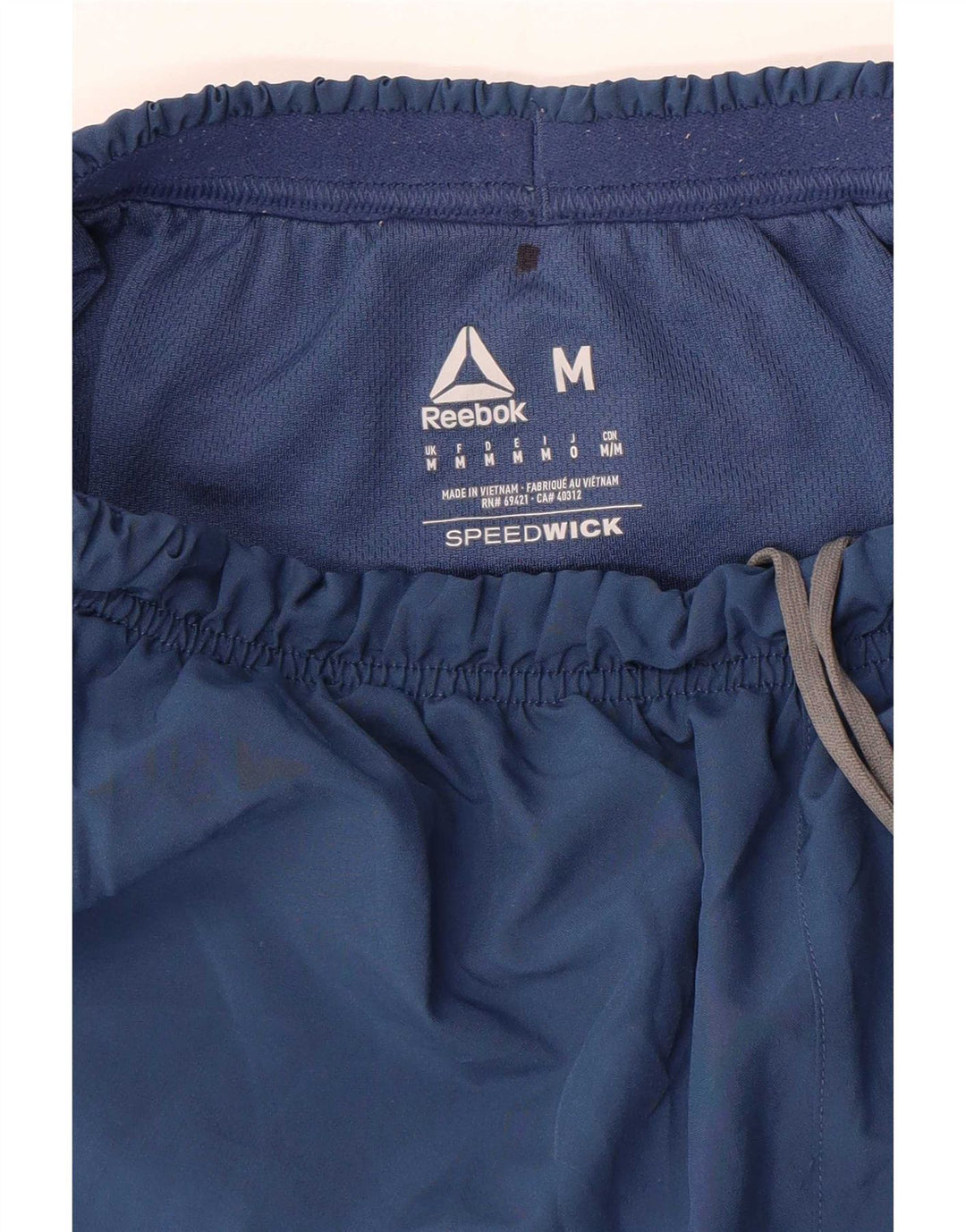 Reebok Short de Sport Speedwick Homme Bleu Marine Moyen