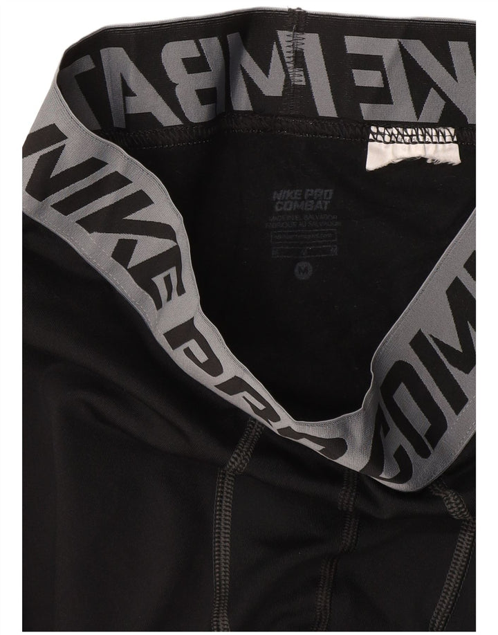 Legging graphique Nike Homme Noir Moyen
