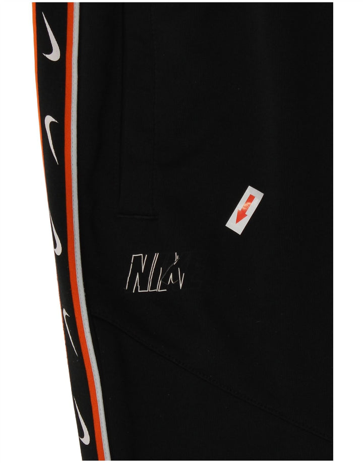 Nike Pantalon de survêtement graphique pour femme UK 14 Polyester noir moyen
