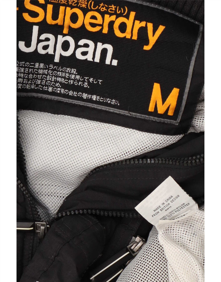 Superdry Veste de Pluie Femme UK 14 Medium Noir