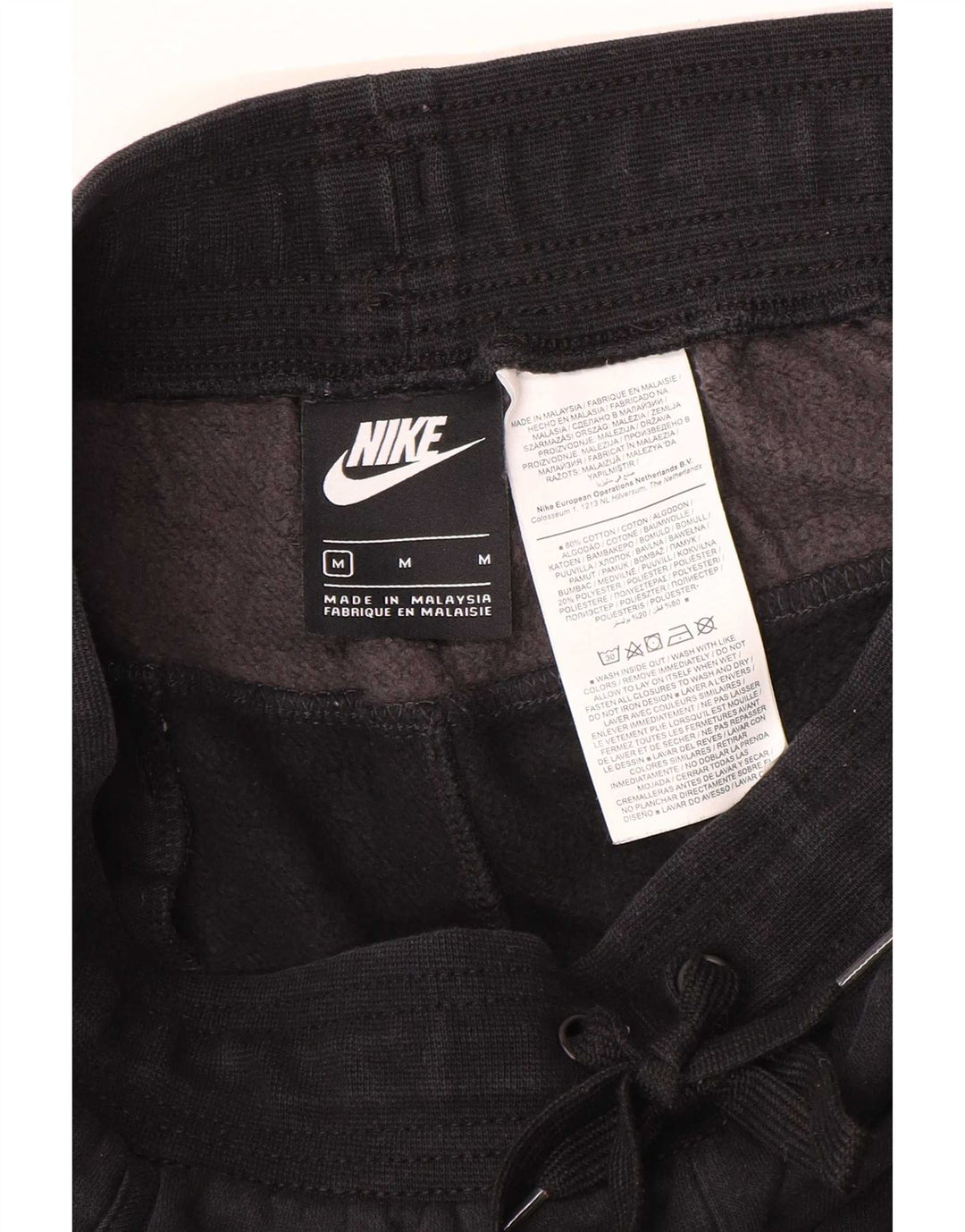 Nike Pantalon de survêtement graphique pour homme Noir moyen Colourblock
