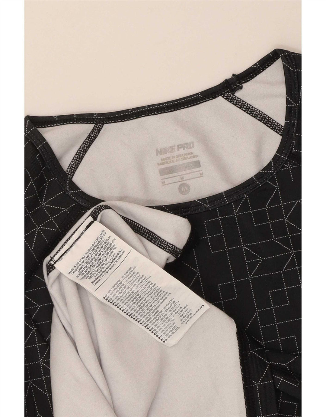 Nike Haut Dri Fit à manches longues pour femme UK 12 Polyester géométrique noir moyen