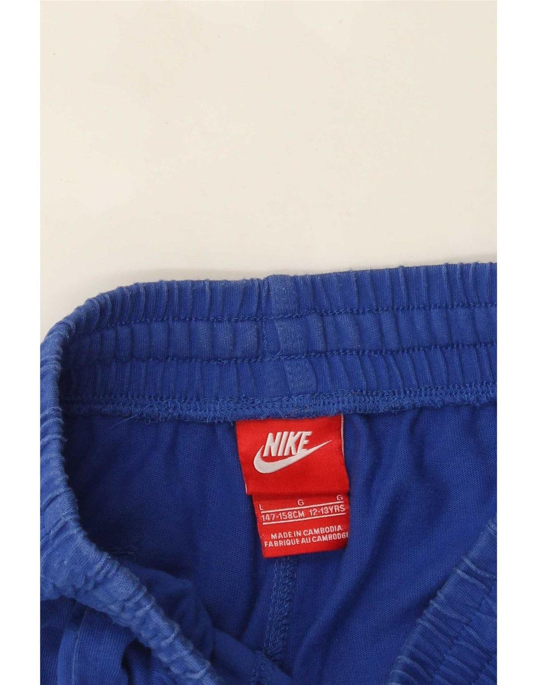 Nike Short de sport graphique pour garçon 12-13 ans Bleu Taille L