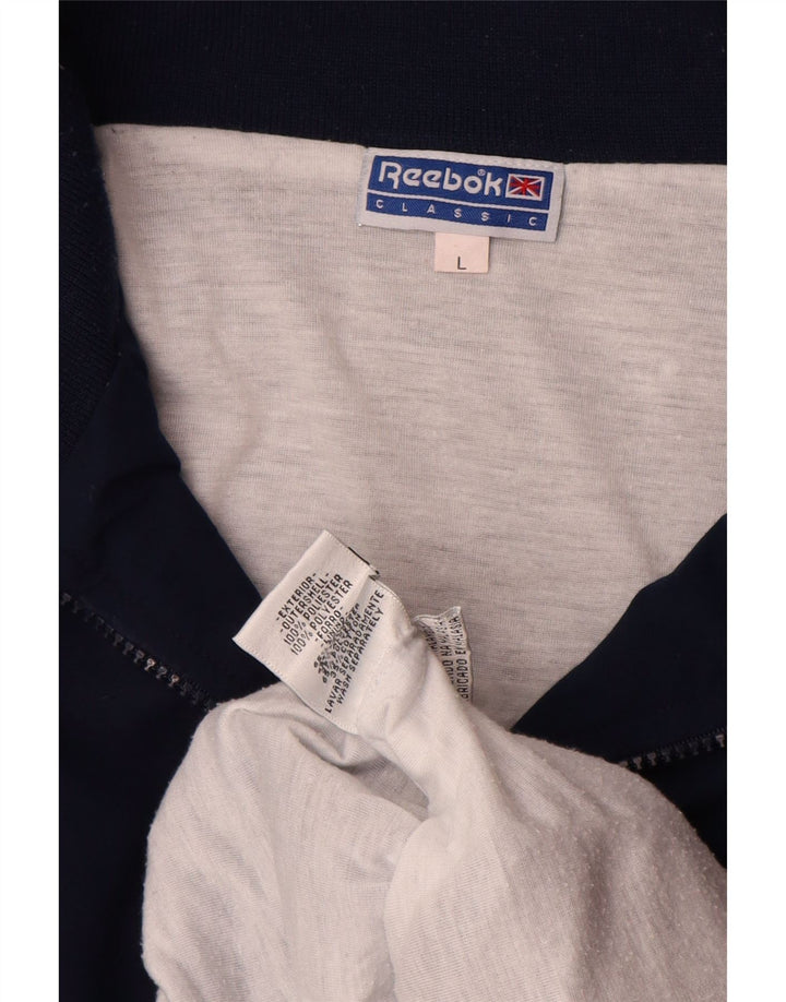 Reebok Veste de Survêtement Graphique Homme Large Bleu Marine Colourblock