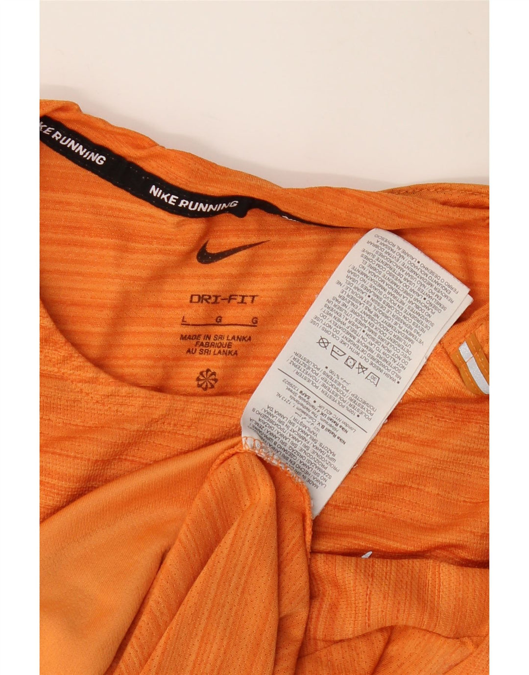 NIKE T-shirt Dri Fit pour homme en polyester à fines rayures orange