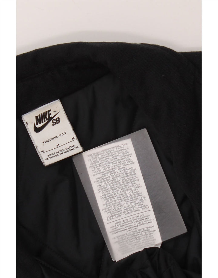 Nike Veste matelassée Therma-Fit pour homme UK 38 en coton noir moyen