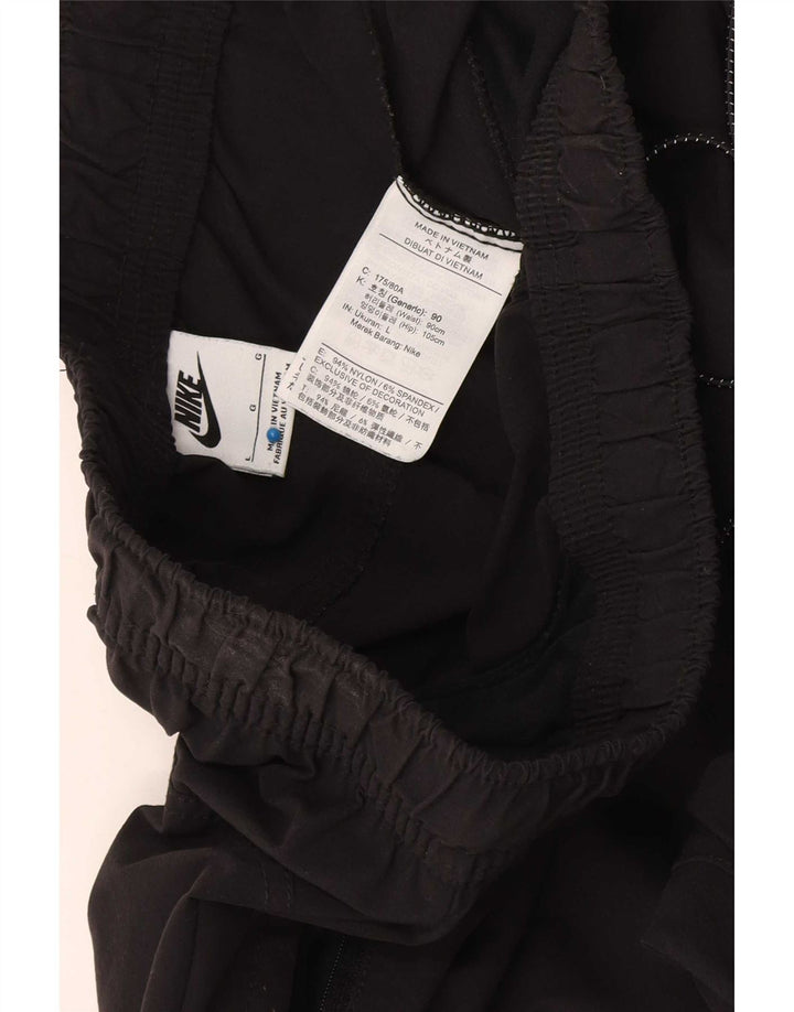 Nike Pantalon de survêtement cargo graphique pour hommes, grand, en nylon noir